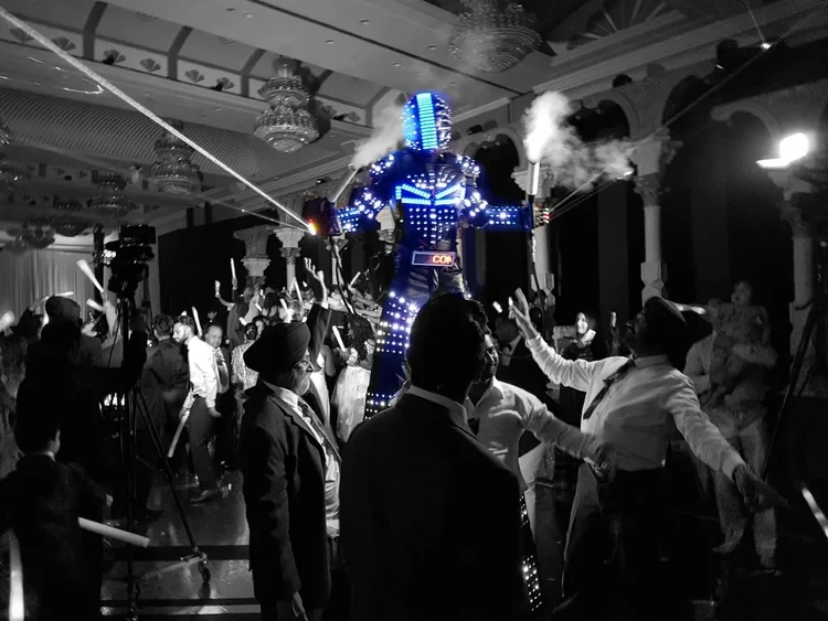LED Robot stilt performer in futuristic costume